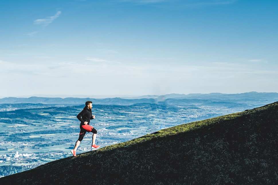 Marton Gyarmati Running at Wildspitz with Zug in the background